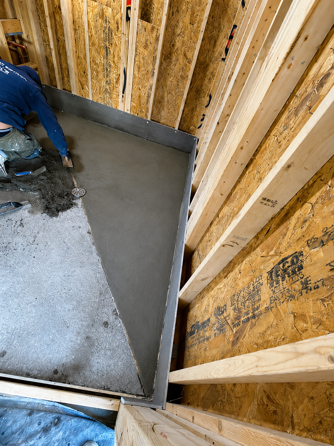Shower subfloor preparation for tile installation by Tile of America on Cape Cod