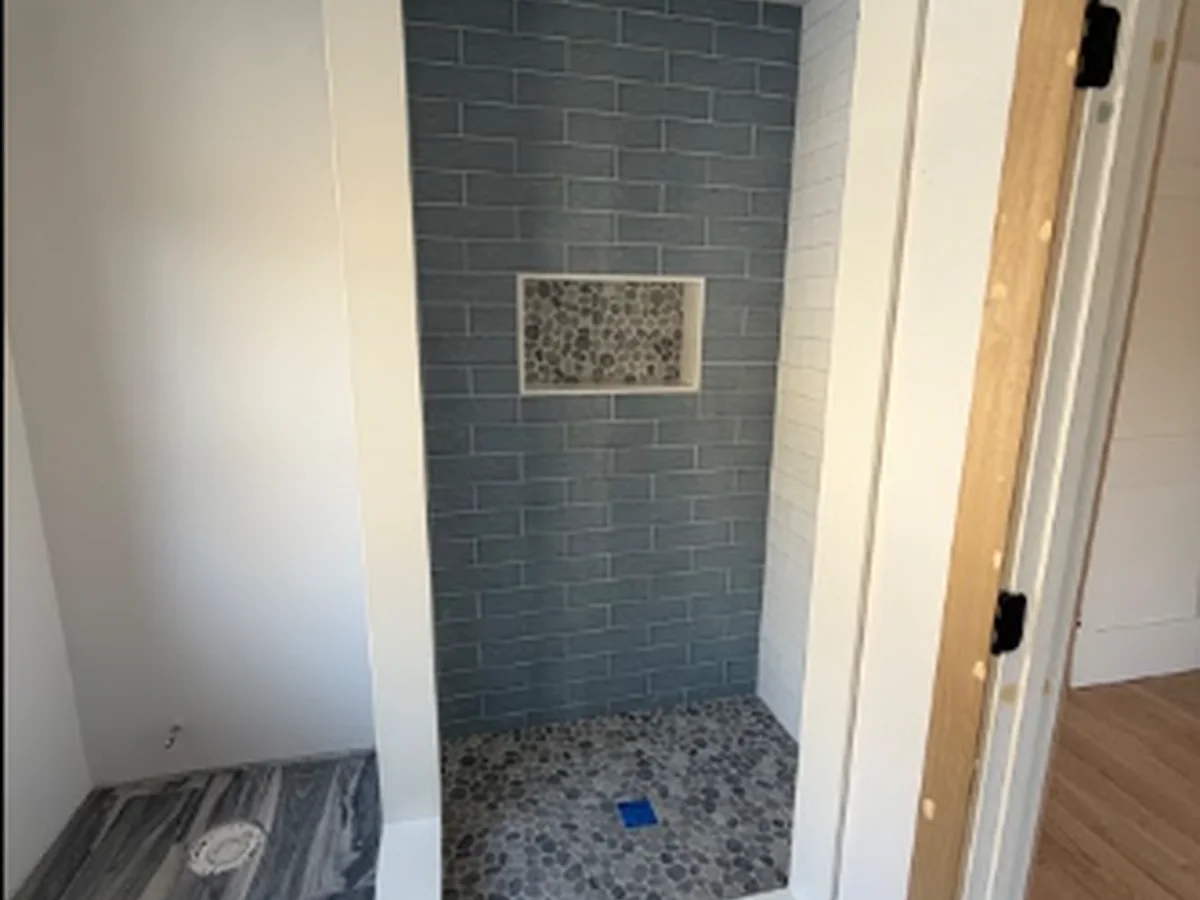 Shower tile installation in a Cape Cod home