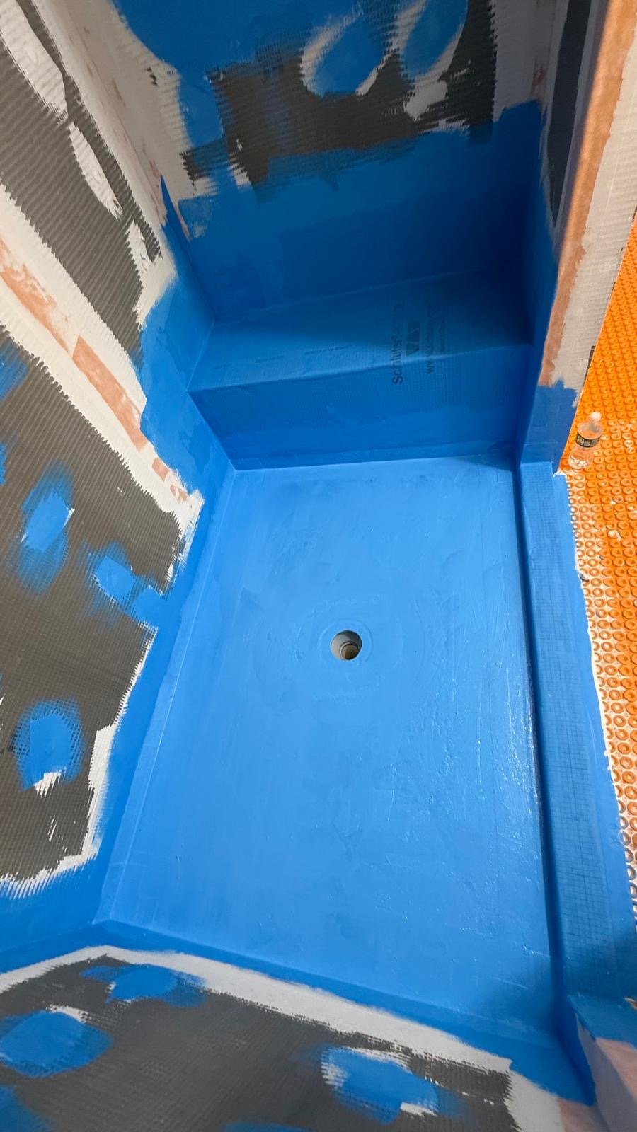 Blue basin shower tile installation by Tile of America in West Yarmouth MA